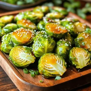 - 1 lb Brussels sprouts, trimmed and halved - 2 tablespoons olive oil - Salt and pepper to taste - 3 tablespoons honey - 2 tablespoons Sriracha sauce - 1 tablespoon soy sauce - 1 garlic clove, minced - 1 teaspoon sesame seeds (optional, for garnish) - Chopped green onion (for garnish) For Brussels sprouts, use fresh ones for the best taste. Frozen sprouts can work, but they may not crisp well. Olive oil adds richness, but you can swap it for avocado oil. Honey gives sweetness, but maple syrup is a great vegan option. For heat, adjust Sriracha to your liking or try chili paste. Soy sauce adds depth, but tamari works for gluten-free diets. - Calories: 150 - Total Fat: 8g - Saturated Fat: 1g - Cholesterol: 0mg - Sodium: 200mg - Total Carbohydrates: 19g - Dietary Fiber: 6g - Sugars: 8g - Protein: 4g This dish is rich in vitamins and minerals. Brussels sprouts are high in fiber and vitamin C. The honey adds natural sugars, while Sriracha brings that spicy kick. Enjoy this tasty twist on a classic veggie! First, gather your ingredients. You will need: - 1 lb Brussels sprouts, trimmed and halved - 2 tablespoons olive oil - Salt and pepper to taste - 3 tablespoons honey - 2 tablespoons Sriracha sauce - 1 tablespoon soy sauce - 1 garlic clove, minced - 1 teaspoon sesame seeds (optional, for garnish) - Chopped green onion (for garnish) Next, preheat your oven to 400°F (200°C). This step is key for crispy sprouts. In a mixing bowl, toss the halved Brussels sprouts with olive oil, salt, and pepper. Make sure every sprout gets a nice coat. This helps them roast evenly. Spread the coated Brussels sprouts on a baking sheet lined with parchment paper. This keeps them from sticking. Roast in the oven for 20-25 minutes. Halfway through, turn the sprouts for even cooking. They should be tender and crispy when done. While the sprouts roast, prepare your honey Sriracha sauce. In a small bowl, whisk together honey, Sriracha, soy sauce, and minced garlic. Mix until everything combines well. When the Brussels sprouts finish roasting, take them out of the oven. Drizzle the honey Sriracha sauce over them. Toss gently to coat all the sprouts. Return the baking sheet to the oven for an extra 5 minutes. This step allows the sauce to caramelize a bit, adding flavor. Finally, take them out and transfer to a serving dish. Garnish with sesame seeds and chopped green onions. Enjoy your delicious, flavorful meal! To get that ideal crunch, choose fresh Brussels sprouts. They should be bright green and firm. Trim the ends and cut them in half. This helps them roast evenly. Use enough olive oil to coat the sprouts well. Too little oil leads to soggy veggies. Roast them in a single layer on the baking sheet. This allows for proper airflow and crispness. Don’t overcrowd the pan; give each sprout space. Halfway through roasting, give them a good toss. This ensures all sides get that nice golden color we love. Feel free to tweak the honey Sriracha sauce. If you like it sweeter, add more honey. For extra heat, increase the Sriracha. Want a tangy twist? Try adding a splash of lime juice. You can also mix in some ginger for a warm, spicy kick. If soy sauce isn’t your thing, coconut aminos are a great swap. This keeps the flavor rich while being soy-free. Use a sturdy baking sheet for even roasting. A rimmed sheet prevents any sauce spills. Parchment paper is a must; it stops sticking and makes cleanup easy. A mixing bowl helps you toss the sprouts with oil and spices. Lastly, a whisk is handy for blending the sauce smoothly. These tools make your cooking process smooth and enjoyable. {{image_2}} For a vegan version, swap honey for maple syrup. It adds sweetness and keeps the dish plant-based. Use two tablespoons of maple syrup instead of honey. The Sriracha sauce remains the same. It brings the heat that we love. This small change makes the dish suitable for everyone. Trust me, the flavors stay bold and delicious. This recipe is already gluten-free if you choose the right soy sauce. Look for tamari, a great gluten-free option. It has a rich taste that compliments the Sriracha well. Make sure to check labels on your Sriracha. Some brands might contain gluten. With these easy swaps, you can enjoy Honey Sriracha Brussels Sprouts without worry. Brussels sprouts pair beautifully with many dishes. For meat lovers, serve them with grilled chicken or steak. The sweet and spicy sauce enhances the meat flavors. If you prefer a vegetarian dish, try serving them with quinoa or brown rice. This adds texture and makes a filling meal. For a lighter option, pair with a fresh salad. Mixing and matching helps fit any diet. Enjoy experimenting with your favorites! To keep your Honey Sriracha Brussels sprouts fresh, let them cool first. Place them in an airtight container. They can last in the fridge for about 3 to 4 days. Make sure to store them without any extra sauce. This helps keep them crisp for later. When you want to enjoy your leftovers, preheat your oven to 350°F (175°C). Spread the Brussels sprouts on a baking sheet. Heat them for about 10-15 minutes. This method helps them regain their crispness. You can also use a microwave, but they may turn soft. If using a microwave, heat them in short bursts, checking often. You can freeze Brussels sprouts, but it’s best to do it before cooking. First, wash and trim the sprouts. Blanch them in boiling water for 3 minutes, then cool them in ice water. Once cool, drain and pat dry. Place them in a freezer-safe bag or container. They can last up to 3 months in the freezer. When ready to cook, thaw them overnight in the fridge before roasting. Brussels sprouts take about 20 to 25 minutes to roast at 400°F (200°C). They should become tender and crispy. Remember to turn them halfway through cooking for even crispness. This helps them roast well and get a nice golden color. If your sprouts are larger, they may need a few extra minutes. Check for doneness with a fork. If it easily pierces the sprout, it's ready! Yes, you can! If you want to avoid Sriracha, try using another hot sauce. You could use chili garlic sauce for a similar kick. If you prefer a milder flavor, use sweet chili sauce or even barbecue sauce. Each option will give a unique taste to the Brussels sprouts. Mixing your favorite sauce can lead to tasty results. Just keep an eye on the balance of sweet and spicy. Honey Sriracha Brussels sprouts pair well with many dishes. Here are some great options: - Grilled chicken or shrimp - Quinoa or brown rice - Roasted sweet potatoes - A fresh green salad - Stir-fried vegetables These sides add color and flavor, making your meal more complete. Mix and match these sides to find your favorite combination! Understanding how to prepare Honey Sriracha Brussels sprouts can elevate your cooking. We covered essential ingredients, preparation steps, and tips for a perfect dish. You learned ways to customize the sauce and adapt the recipe for different diets. Proper storage and reheating ensure you enjoy leftovers without losing flavor. Keep these insights in mind as you experiment in your kitchen. I hope this helps you cook delicious Brussels sprouts that impress everyone at your table. Happy cooking!