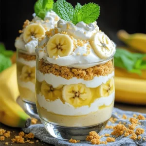- 2 ripe bananas, sliced - 1 cup heavy whipping cream - 1/2 cup powdered sugar - 1 teaspoon vanilla extract - 1/2 cup vanilla pudding mix - 1 1/2 cups milk - 1 cup graham cracker crumbs - 1/4 cup unsweetened coconut flakes (optional) - Fresh mint leaves Gathering the right ingredients makes a big difference. I love using ripe bananas. They add the best flavor. The heavy whipping cream gives the parfait its dreamy texture. Powdered sugar sweetens the deal. A touch of vanilla extract enhances all the flavors. For pantry staples, I always keep vanilla pudding mix on hand. It helps create a creamy base. Milk adds the right consistency and richness. Graham cracker crumbs give a crunchy layer. You can also use coconut flakes for extra flair, but it’s not a must. If you want to dress up your parfaits, fresh mint leaves are a lovely touch. They add color and a fresh taste. Each layer works together to create a delightful dessert treat. - In a medium bowl, mix the vanilla pudding mix and milk until smooth. - Let the mixture sit for about 5 minutes to thicken. This gives it a nice, creamy texture. - In a separate bowl, beat the heavy whipping cream until soft peaks form. - Gradually add the powdered sugar and vanilla extract. Keep beating until stiff peaks form. This cream will add a fluffy touch to your parfaits. - Start by placing a layer of graham cracker crumbs at the bottom of your serving glasses. - Then, add a layer of the fluffy banana cream mixture over the crumbs. - Next, pile on some sliced bananas. - Repeat these layers until the glasses are full, ending with the fluffy cream on top. - For a fun finish, sprinkle coconut flakes over the top if you like. You can also add fresh mint leaves for a pop of color. To know when your whipped cream is ready, watch for soft peaks first. When you lift the beaters, the cream should hold its shape but still have a soft curve. Avoid overbeating by stopping as soon as you see stiff peaks form. Overbeaten cream turns grainy, losing its nice texture. For even layers, use the same amount of filling and bananas each time. This keeps layers neat and pretty. I recommend clear glasses so you can see all those beautiful layers. Mason jars or parfait cups work well too. You can add chocolate by mixing cocoa powder into the cream. Chopped nuts also add a nice crunch. Don’t be afraid to try other fruits like strawberries or blueberries for a fresh twist. Mix it up and find your favorite! {{image_2}} You can make chocolate banana cream parfaits by adding cocoa powder. Mix two tablespoons of cocoa powder into the vanilla pudding mix. This will give your parfaits a rich chocolate flavor. You can also top them with chocolate shavings or mini chocolate chips for extra fun. If you need a gluten-free dessert, switch to gluten-free graham crackers. You can find these at most grocery stores. Crush them just like regular graham crackers. This way, you can still enjoy that crunchy layer without the gluten. For a vegan twist, use coconut cream instead of heavy cream. Whip it just like you would regular cream. Use almond or oat milk for the pudding mix. There are many plant-based vanilla pudding mixes available too. These swaps keep the dessert creamy and delicious without dairy. To keep your parfaits fresh, store them in the refrigerator. Place them in airtight containers or cover with plastic wrap. This will help prevent them from absorbing other odors. Parfaits taste best when eaten within three days of making. After that, the bananas may turn brown and the layers can lose their texture. You can freeze parfaits, but it might change the texture. If you decide to freeze, do not freeze the assembled parfaits. Instead, freeze each layer separately. You can freeze the banana cream mixture and graham cracker crumbs in zip-top bags. When you want to enjoy a parfait, just thaw the layers in the fridge overnight. Since parfaits are best cold, you don’t need to reheat them. If you freeze the layers, thaw them slowly in the fridge. This helps maintain their taste and texture. Avoid microwaving the layers, as this can make them mushy and less enjoyable. Yes, you can use many fruits in this parfait! - Strawberries are a great choice. - Peaches add a nice sweetness. - Berries bring a tart flavor. - You can even try mangoes for a tropical twist. These fruits will mix well with the fluffy cream. The pudding needs about 5 minutes to set. - This time is key for a creamy texture. - Letting it rest helps it thicken properly. - If you skip this step, the parfait may be runny. Patience pays off with a perfect dessert! Yes, you can make these parfaits in advance! - Prepare the layers separately for best results. - Store the pudding and whipped cream in the fridge. - Assemble them right before serving. This keeps the layers fresh and tasty. Making them ahead saves you time on dessert day! In this post, we explored making delicious banana parfaits. You learned about the fresh and pantry ingredients, plus optional garnishes. The step-by-step guide showed how to prepare pudding and whipped cream, layer your parfait, and add tasty toppings. Remember to use fresh ingredients for the best flavor. Enjoy experimenting with variations and don’t be afraid to try new fruits. With these tips, your banana parfaits will impress everyone!