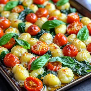 To make this dish, gather these key ingredients: - 1 pound potato gnocchi (store-bought or homemade) - 2 tablespoons olive oil - 4 cloves garlic, minced - 1 cup cherry tomatoes, halved - 1 cup baby spinach - 1 cup grated Parmesan cheese - Salt and pepper to taste These ingredients form the base of your bake. The gnocchi give a nice texture, while the garlic adds a rich flavor. For those who want to enhance the taste, consider these optional items: - 1 teaspoon dried oregano - 1 teaspoon red pepper flakes (optional) These additions bring warmth and depth. Oregano adds a touch of earthiness, while red pepper flakes give a hint of heat. Seasoning makes each bite special. Use these essentials: - Salt and pepper to taste - Fresh basil leaves for garnish Salt and pepper bring out the best flavors. Fresh basil adds a pop of color and a fresh taste that brightens the dish. Don't skip the garnish; it makes the dish look beautiful! Start by preheating your oven to 425°F (220°C). This high heat helps the gnocchi get crispy. Next, take a large sheet pan and line it with parchment paper. This makes cleanup a breeze. In a big mixing bowl, add 1 pound of potato gnocchi. Drizzle in 2 tablespoons of olive oil, then toss in 4 cloves of minced garlic. Add 1 cup of halved cherry tomatoes and 1 cup of baby spinach. Mix it all together. Now, sprinkle in 1 teaspoon of dried oregano and optional red pepper flakes for some heat. Season with salt and pepper to taste. Toss again to ensure every piece is coated nicely. Spread the gnocchi mixture evenly on the prepared sheet pan. Bake it in the oven for 15-20 minutes. You want the gnocchi to turn golden brown and crispy around the edges. After that, take the pan out and sprinkle 1 cup of grated Parmesan cheese over the top. Return it to the oven for another 5 minutes. This melts the cheese and makes it bubbly. Once done, let it cool for a few minutes. Finally, garnish your dish with fresh basil leaves for a pop of color and flavor! Enjoy your meal! To get gnocchi that is golden and crispy, follow these tips: - Use a large sheet pan. This allows for even cooking. - Spread the gnocchi mixture in a single layer. Crowding the pan can lead to soggy gnocchi. - Bake until they are slightly crispy on the edges. This usually takes 15-20 minutes. - Add cheese at the end. This helps it melt beautifully without burning. You can change the flavors to fit your taste. Here are some ideas: - Add cooked sausage or chicken for protein. - Use different veggies like bell peppers or zucchini. They add color and taste. - Swap out the red pepper flakes for fresh herbs. Basil or thyme can give a fresh twist. - Try different cheese, like mozzarella or feta, for a unique flavor. Sometimes, things do not go as planned. Here are some common problems and fixes: - If the gnocchi are too soft, check your cooking time. They need to be baked until crispy. - If the cheese is not melting well, try grating it finely. This helps it melt faster and more evenly. - If your dish is too salty, add a splash of lemon juice. This can balance out the flavors nicely. - For leftover gnocchi that is too dry, reheat with a bit of olive oil or broth. This will bring back moisture. {{image_2}} You can easily make this dish vegetarian. Just keep the gnocchi and veggies. For a vegan twist, swap the Parmesan with nutritional yeast. This gives a cheesy flavor without dairy. You can also add more veggies, like bell peppers or zucchini. They add color and taste, making the dish even better! If you have dietary needs, there are great swaps. For gluten-free gnocchi, look for brands made from rice or corn. Olive oil can be replaced with avocado oil for a different taste. If you’re watching salt, use low-sodium broth instead of adding salt directly. This keeps the dish tasty while meeting your health goals. Want to change things up? Try different cheeses. Feta or goat cheese can add a tangy kick. Mix in fresh herbs, like thyme or rosemary, for a fresh taste. If you love spice, add more red pepper flakes or switch to a spicy cheese. Each change can make this dish special and new! Once you finish your Sheet-Pan Garlic Parmesan Gnocchi Bake, let it cool down. Cooling helps keep the texture right. Place it in a shallow dish for faster cooling. Cover the dish tightly with plastic wrap or a lid. This keeps it fresh in the fridge. When you're ready to enjoy leftovers, I recommend reheating in the oven. Preheat the oven to 350°F (175°C). Place the gnocchi in an oven-safe dish. Cover it with foil to keep moisture in. Heat for about 15-20 minutes or until warm. You can also reheat in the microwave if you're in a hurry. Just use a microwave-safe dish and cover it loosely. Freezing is a great option for meal prep. Allow your gnocchi bake to cool completely. Then, transfer portions into freezer-safe bags. Squeeze out as much air as you can before sealing. Label the bags with the date and store them in the freezer. For best quality, use them within three months. When you’re ready to eat, thaw in the fridge overnight before reheating. Yes, you can use homemade gnocchi. Fresh gnocchi adds a special touch to the dish. Just make sure your dough is firm enough to hold its shape when cooked. If you use it, cook it for a shorter time to prevent overcooking. You can serve this dish with a fresh green salad. A side of crusty bread works well too. For protein, grilled chicken or shrimp pairs nicely. You can also add a drizzle of balsamic glaze for extra flavor. Leftovers last up to three days in the fridge. Store them in an airtight container for best results. When you're ready to eat, just reheat in the oven or microwave. Yes, you can make a gluten-free version. Look for gluten-free gnocchi at your local store. You can also make your own using gluten-free flour. Just keep an eye on the texture, as it may differ slightly from regular gnocchi. This blog post explored the simple joy of cooking sheet-pan gnocchi. We discussed key ingredients, helpful steps, and useful tips to enhance your dish. I shared options for various diets and flavor twists to keep it fresh. Remember to store leftovers properly for the best taste. Now, you can enjoy your meal and impress others. Get creative with your gnocchi and make it your own! Cooking should be fun and tasty. Enjoy your culinary adventure!