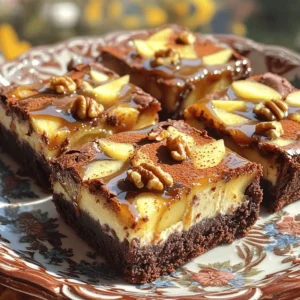 To make the brownies, you need: - 1 cup unsalted butter, melted - 1 1/2 cups granulated sugar - 1 cup brown sugar, packed - 4 large eggs - 1 teaspoon vanilla extract - 1 1/2 cups all-purpose flour - 1 cup unsweetened cocoa powder - 1/2 teaspoon baking powder - 1/4 teaspoon salt - 2 apples, peeled and diced (preferably Granny Smith) - 1 teaspoon cinnamon These ingredients create a rich and fudgy base for your brownies. The apples add a fresh twist. For the creamy layer, gather: - 8 oz cream cheese, softened - 1/3 cup powdered sugar - 1 egg - 1/2 teaspoon vanilla extract (for cheesecake layer) This creamy layer gives a smooth texture that pairs well with the brownie base. You can enhance your brownies with: - 1/2 cup caramel sauce (store-bought or homemade) - Chopped nuts (e.g., walnuts or pecans) for topping (optional) These toppings add extra flavor and crunch. You can also try different nuts or even chocolate chips for more variety. 1. Start by preheating your oven to 350°F (175°C). 2. Grease a 9x13 inch baking dish or use parchment paper. This helps with easy removal later. 3. In a large bowl, whisk together 1 cup of melted butter, 1 1/2 cups of granulated sugar, and 1 cup of brown sugar. Mix until everything is well combined. 4. Add 4 large eggs, one at a time. Make sure to mix well after each addition. Stir in 1 teaspoon of vanilla extract for extra flavor. 5. In another bowl, mix 1 1/2 cups of all-purpose flour, 1 cup of cocoa powder, 1/2 teaspoon of baking powder, and 1/4 teaspoon of salt. 6. Gradually add the dry mix to the wet mix. Stir until just combined. 7. Gently fold in 2 peeled and diced apples and 1 teaspoon of cinnamon. This adds a nice fruity touch to your brownies. 8. Spread about two-thirds of the brownie batter into your prepared baking dish. Make sure to create an even layer at the bottom. 9. In a new bowl, mix 8 oz of softened cream cheese, 1/3 cup of powdered sugar, 1 egg, and 1/2 teaspoon of vanilla extract. Blend until smooth and creamy. 10. Pour this cream cheese mixture over the brownie layer. Spread it evenly to cover the batter. 11. Drop spoonfuls of the remaining brownie batter on top of the cream cheese layer. Use a knife to swirl the layers together for a marbled effect. 12. Drizzle 1/2 cup of caramel sauce over the top. If you want, sprinkle with chopped nuts like walnuts or pecans. 13. Bake in the preheated oven for 30-35 minutes. The edges should be set, and a toothpick inserted in the center should come out with a few moist crumbs. 14. Allow the brownies to cool completely in the pan before slicing them into squares. 15. For a lovely presentation, serve on a decorative plate. Drizzle with more caramel sauce and sprinkle with cinnamon. 16. A scoop of vanilla ice cream on the side makes for a delightful finish. Enjoy this treat! To get the best brownie texture, follow a few key steps. Use unsalted butter to control the salt level. Melt it completely for a smooth mix. Mix the sugars well with the melted butter. Whisk in the eggs one at a time. This helps create a light and fluffy batter. Do not overmix the flour. Just combine until you see no dry bits. Gently fold in the apples and cinnamon to keep the chunks intact. Avoid adding too much flour; it makes brownies dry. Do not skip the baking powder; it helps the brownies rise. Be careful not to overbake, or you’ll lose that fudgy center. Check with a toothpick; it should come out with a few moist crumbs. Also, let the brownies cool completely before cutting. This helps them set and makes slicing easier. You can boost flavor in fun ways. Add a pinch of nutmeg for warmth. Mix in chocolate chips for extra chocolatey goodness. You can also use different apples, like Honeycrisp or Fuji, for a new taste. Try adding chopped nuts for crunch. A sprinkle of sea salt on top enhances the sweet caramel flavor. Explore other toppings like whipped cream or ice cream to make it special. {{image_2}} For this dessert, you can choose different apples. Granny Smith apples work well for their tartness. They balance the sweet caramel and cheesecake. Other great choices are Honeycrisp for sweetness or Fuji for a mellow flavor. Each type gives a unique twist to your brownies. Try mixing them for a complex taste! If you need gluten-free brownies, swap regular flour for a gluten-free blend. Make sure it has xanthan gum for texture. You can also use almond flour as a substitute. This will change the flavor slightly but will still be delicious. Just keep an eye on baking time, as it may differ. You can add chocolate chips for extra sweetness. Dark chocolate chips add richness to the brownies. A sprinkle of nutmeg or allspice can enhance the flavor, too. If you love nuts, add walnuts or pecans for crunch. Each choice helps you create a new version of this treat! You can store Caramel Apple Cheesecake Brownies easily. Allow them to cool fully in the pan. Once cooled, cut them into squares. Place them in an airtight container. They will stay fresh for up to four days at room temperature. If you want to keep them longer, consider refrigerating them. Just remember to let them sit at room temperature before serving. Freezing these brownies is a great option. Wrap each brownie square tightly in plastic wrap. Then, place them in a freezer-safe bag or container. They can last up to three months in the freezer. When you’re ready to enjoy them, remove the brownies from the freezer. Let them thaw in the fridge overnight or on the counter for a few hours. To reheat your brownies and keep them tasty, use the oven. Preheat it to 350°F (175°C). Place the brownies on a baking sheet. Heat them for about 10 minutes. This method keeps the texture nice and chewy. You can also use the microwave. Heat a brownie for about 15-20 seconds, but be careful not to overheat. Enjoy your warm brownies with a drizzle of caramel sauce for an extra treat! Yes, you can make these brownies ahead of time. They store well. Bake them a day before you plan to serve. Just cover them tightly. Keep them in the fridge for freshness. Allow them to come to room temperature before serving. They taste great even after a day or two. To lower the sugar in this recipe, you can reduce the granulated and brown sugars. Try using half the amount. You can also use sugar substitutes. Look for options like stevia or erythritol. Just keep in mind that this may change the texture. Experiment to find what you like best. Yes, you can substitute cream cheese. Use Greek yogurt for a lighter option. Silken tofu works well for a dairy-free choice. Both options provide a creamy texture, but the flavor may differ. Adjust the sugar if needed to balance the taste. These brownies pair well with many things. A scoop of vanilla ice cream complements the flavors nicely. You can also serve them with whipped cream. For a crunchy touch, add chopped nuts on top. A drizzle of extra caramel sauce adds sweetness and contrast. Enjoy experimenting with these pairings! You learned how to make caramel apple cheesecake brownies. We covered the key ingredients, from the brownie base to the cream cheese layer. I shared step-by-step instructions for preparing, baking, and serving. You also gained tips to perfect your brownies and avoid common mistakes. Variations let you customize flavors, while storage info ensures they stay fresh. Experiment and enjoy this treat! You'll find it's fun to make and share.