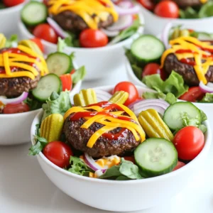 - 1 lb ground beef (or turkey for a lighter option) - 4 cups mixed salad greens (like romaine and spinach) - 1 cup cherry tomatoes, halved - 1 cucumber, sliced - 1/2 red onion, thinly sliced - 1 cup pickles, sliced - 1 cup shredded cheddar cheese The main ingredients in a burger bowl make it a fun meal. You can choose ground beef for a classic taste or turkey for a lighter option. The mixed salad greens give it a fresh base. Cherry tomatoes and cucumber add sweetness and crunch. The red onion and pickles bring a nice tang, while cheese adds richness. - 1/2 cup ketchup - 1/4 cup mustard - 1/4 cup mayonnaise - 2 tablespoons olive oil - Garlic powder, onion powder, salt, and pepper Condiments make your burger bowl burst with flavor. Ketchup, mustard, and mayonnaise are classic choices. You can drizzle them on top of your bowl for a tasty finish. Olive oil adds a nice touch and helps season the beef. Don't forget the garlic and onion powder, salt, and pepper for extra flavor. A serving of this burger bowl has about 480 calories. It includes a good balance of protein, carbs, and fats. If you choose turkey and reduced-fat cheese, you can cut calories and fat. This gives you a lighter meal without losing flavor. You can easily adjust ingredients to fit your dietary needs. To make tasty burger patties, start with the meat. You can use ground beef or turkey. In a bowl, mix the meat with: - 1 tablespoon garlic powder - 1 teaspoon onion powder - Salt and pepper to taste Mix it well until all the spices blend into the meat. This step brings out the flavors nicely. Next, heat a skillet over medium-high heat. Add 2 tablespoons of olive oil to the pan. Once the oil is hot, form the meat into small patties. Cook each patty for about 4-5 minutes on each side. You want them juicy and cooked to your liking. After cooking, remove them from the heat and let them rest for a bit. Now it’s time to build your burger bowls! Grab four bowls and layer them with 4 cups of mixed salad greens as the base. I like to use a mix of romaine and spinach for a fresh taste. On top of the greens, add: - 1 cup cherry tomatoes, halved - 1 cucumber, sliced - 1/2 red onion, thinly sliced - 1 cup pickles, sliced - 1 cup shredded cheddar cheese Next, cut the cooked burger patties into strips or bite-sized pieces. Place them on top of the colorful salad. This adds a hearty touch! For the final touch, drizzle your bowls with: - 1/2 cup ketchup - 1/4 cup mustard - 1/4 cup mayonnaise Feel free to add fresh herbs for extra flavor and beauty. When serving your burger bowls, presentation is key! Use clear bowls to show off the layers. You can also serve with a side of crispy sweet potato fries or a simple fruit salad. For garnishes, fresh herbs like parsley or cilantro work great. They add color and flavor. Enjoy your meal right away for the best taste! When cooking patties, use medium-high heat. This helps them brown nicely. Cook each patty for about 4-5 minutes per side. Check for doneness by cutting into one. If it’s juicy and brown, it’s ready! Let them rest for a few minutes. This keeps them juicy. To keep your greens fresh, wash them well before use. Dry them with a salad spinner or paper towels. This helps the dressing stick and keeps everything crisp. Store leftover greens in an airtight container to keep them fresh longer. You can add many toppings to make your burger bowls fun. Try avocado slices, bell peppers, or jalapeños for some heat. Crushed tortilla chips add a nice crunch. You can also use different cheeses like feta or mozzarella for a unique twist. For extra flavor, mix your condiments. Try adding a splash of hot sauce to ketchup or mixing mayo with garlic. Fresh herbs like cilantro or parsley can brighten your dish. Experiment with what you love! To make burger bowls more appealing to kids, keep it simple. Use familiar toppings like cheese, tomatoes, and pickles. Let them build their own bowls. Kids love to customize their meals! You can swap ground beef for turkey or chicken to make it lighter. Use fun shapes for vegetables like carrot sticks or cucumber rounds. This makes the meal playful and tasty. {{image_2}} You can swap ground meat for plant-based meat. This makes a tasty burger bowl. Look for brands that mimic beef closely. They often taste great and have a similar texture. For veggies, use fresh options like: - Spinach - Bell peppers - Avocados - Roasted sweet potatoes Mix these into your bowls for crunch and color. You can also add beans or quinoa for protein. To keep it low-carb, skip the beans and grains. Instead, try: - Cauliflower rice - Zucchini noodles - Chopped broccoli These toppings add flavor and keep carbs low. For dressings, use olive oil, vinegar, or a creamy avocado dressing. These choices fit well in a keto diet. Add global flavors to your burger bowls for fun. For a Tex-Mex flair, add: - Black beans - Corn - Salsa You can top with avocado or cheese to make it creamy. For Mediterranean bowls, try: - Hummus - Feta cheese - Sliced olives These changes give your burger bowls a fresh twist. Explore different spices for even more flavor. To store your burger bowl components, first cool them down. Place the meat in an airtight container. Make sure the toppings stay separate. Greens should go in a different container. This keeps them fresh and crisp. Use the veggies within three days for the best taste. Keep cheese and sauces stored in their own containers too. This helps maintain flavor and texture. You can prep for a week’s worth of meals easily. Cook a batch of burger patties and cool them. Slice them into strips and store in the fridge. Wash and cut your veggies ahead of time. Keep them in separate containers. This way, you can grab and mix ingredients quickly. To make assembly simple, layer your greens first when serving. Then, add your prepped toppings. To reheat leftovers, use the microwave or a skillet. For the microwave, heat the meat for 30 seconds at a time. Check if it’s warm enough. If using a skillet, place it on low heat. Add a splash of water to keep it moist. For veggies, heat them for just a minute. You want them warm, not soggy. Always reheat cheese separately if needed. This keeps it melty and tasty. Burger bowls are a fun twist on classic burgers. They mix all your favorite burger parts into a bowl. Instead of a bun, you use fresh salad greens as the base. You can top it with cooked burger patties, cheese, and your favorite toppings. It’s a healthy and tasty way to enjoy burgers. Yes, you can prepare many parts of burger bowls ahead. Cook the burger patties and store them in the fridge. You can wash and chop the salad greens and veggies, like cucumbers and tomatoes. Keep them in airtight containers. This way, you can assemble your bowls quickly during a busy week. To make burger bowls gluten-free, start with gluten-free ground meat. You can use turkey or beef. Use gluten-free condiments like mustard and mayo. Make sure to check labels on all products. Also, substitute traditional salad dressings with gluten-free options. Serve your burger bowls with a side of sweet potato fries or fresh fruit. A light drink like iced tea or lemonade works well too. For a little crunch, add some tortilla chips. These sides make your meal more fun and tasty! We explored how to create delicious burger bowls filled with fresh ingredients and flavors. You learned about choosing meats, veggies, and condiments that suit your taste. We emphasized tips for cooking and keeping ingredients fresh. The variations showed you can easily adapt these bowls to fit different diets. In short, burger bowls are simple, fun, and perfect for meals. Enjoy making your own unique version!
